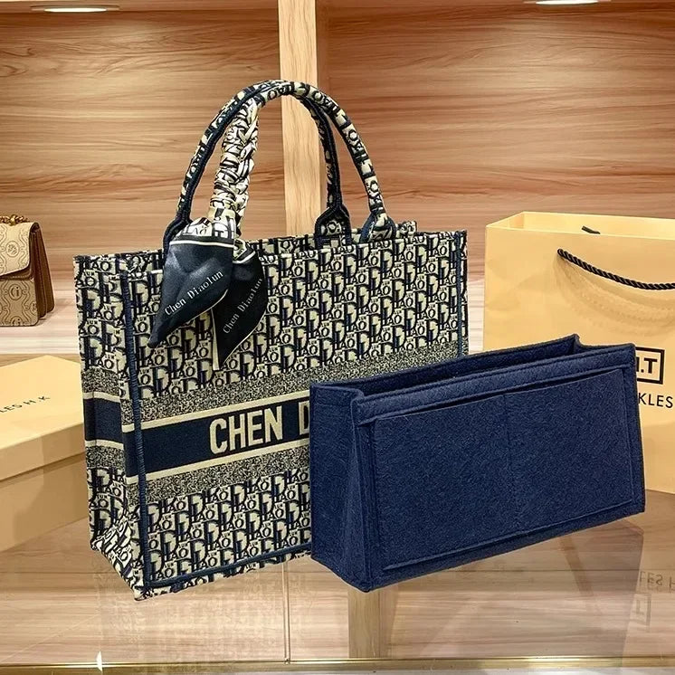 Light luxury leather tote bag, new high-end large-capacity commuting niche single-shoulder handheld women's backpack.